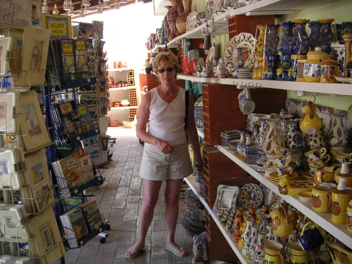 Mom buying more pottery